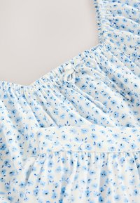 Unselected, blue ditsy