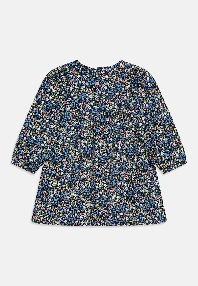 Robe à manches longues pour tout-petit, fond bleu marine avec un petit imprimé floral rose, blanc, jaune et bleu, détail froncé à la taille.