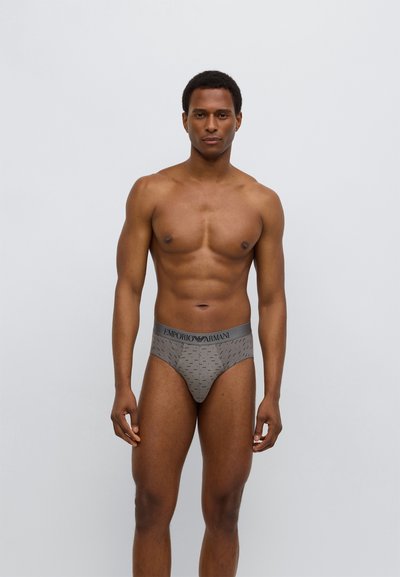 Γκρι ανδρικά εσώρουχα με ελαστική ζώνη μέσης με λογότυπο και διακριτικό μοτίβο. Κατασκευασμένα από απαλό υλικό με άνετη εφαρμογή.