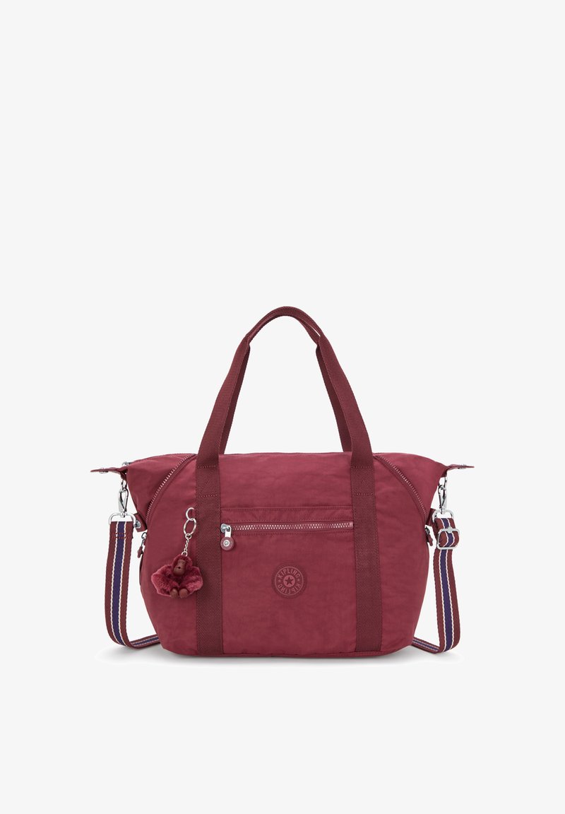 Borsa in tessuto bordeaux con doppio manico e tracolla staccabile a strisce. Presenta una tasca frontale con zip e un dettaglio con charm. Logo circolare sulla parte anteriore.