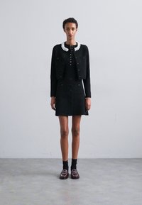 sandro JUPE TRAPEZE POCHES  - Falda acampanada - noir