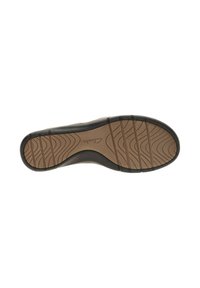 Brown rubber shoe sole with a textured, patterned surface. Features a black edge and grooves for traction. Logo on the surface.