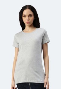 T-shirt grigio a maniche corte realizzato in cotone, con un classico scollo rotondo e una vestibilità rilassata per il massimo comfort. Design semplice e discreto.