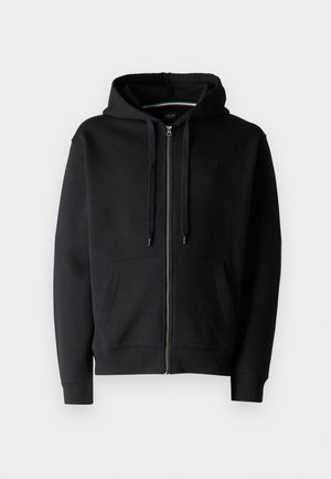 Sudadera con cremallera negra hecha de una mezcla de algodón, que presenta una cremallera frontal, capucha ajustable con cordón y dos bolsillos laterales. Textura suave, puños acanalados.
