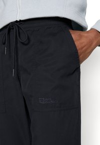 Jack Wolfskin Träningsbyxor - blue