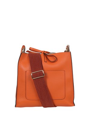 Orange leather handbag with a textured surface, square shape, and a detachable red fabric strap featuring a metal buckle. Includes a front pocket.