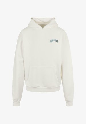 Krémová mikina s kapucňou vyrobená z mäkkého materiálu, s prednou vreckom a malým modrým grafickým textom na ľavej strane hrudníka.