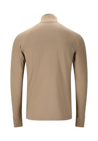 Lange mouwen shirt in lichtbeige, gemaakt van soepele, rekbare stof. Heeft een hoge kraag en een slim fit ontwerp met naadloze schouders.