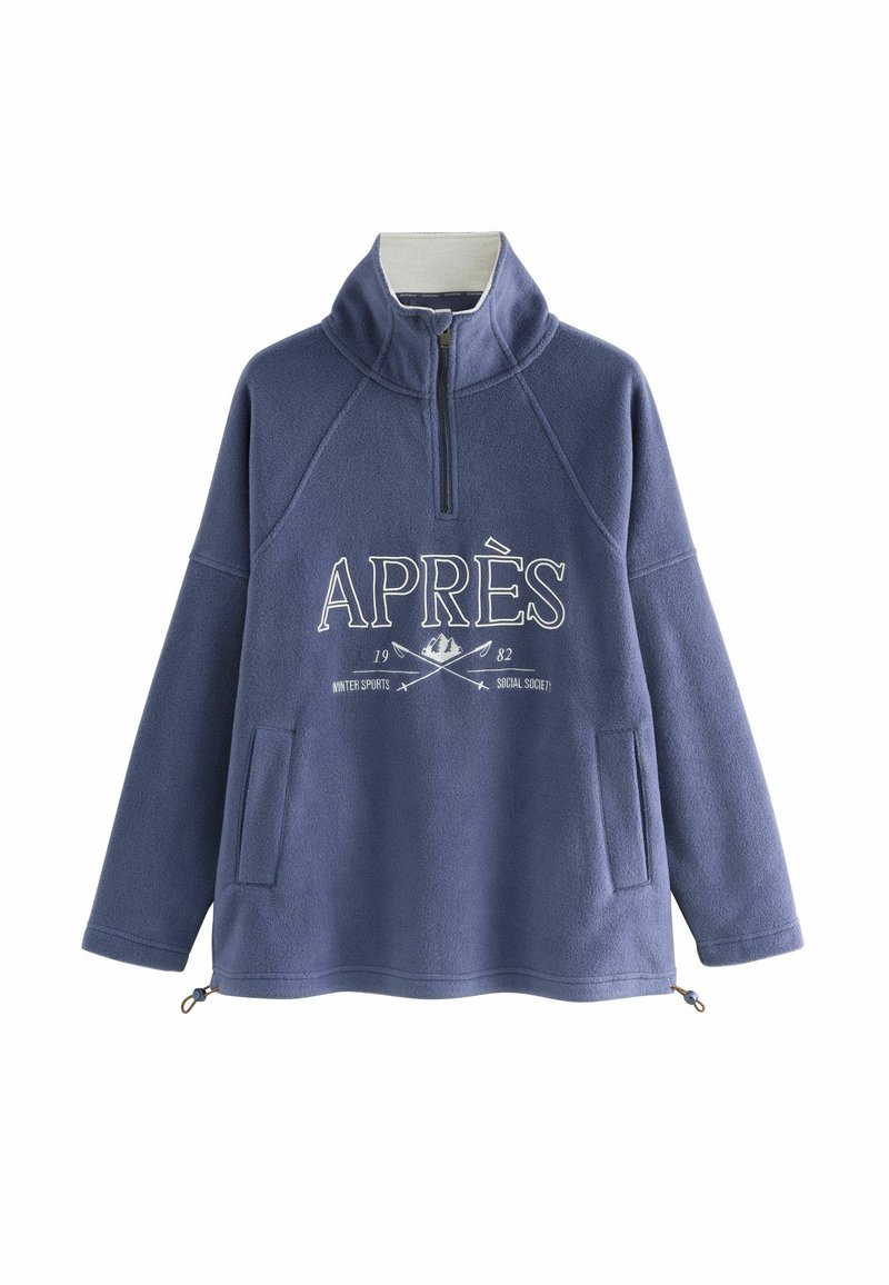 Fleece pullover in dark blue with high collar and zip. Features front pocket, white graphic text “APRÈS”, and contrasting zipper details.