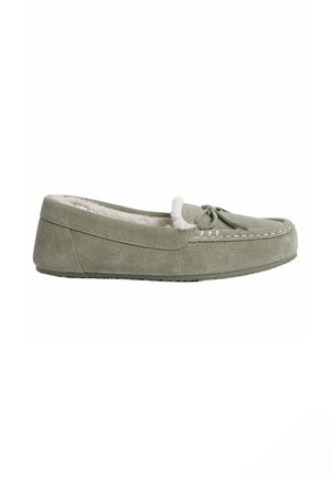 Grøn mokka-sneakers i ruskind med en hvid faux pelsforing, en sløjfeaccent på tåen og en flad gummisål for komfort.