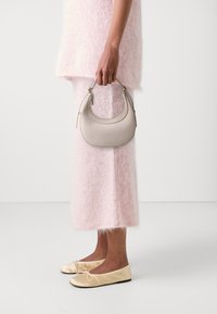 Coccinelle WHISPER - Handbag - white