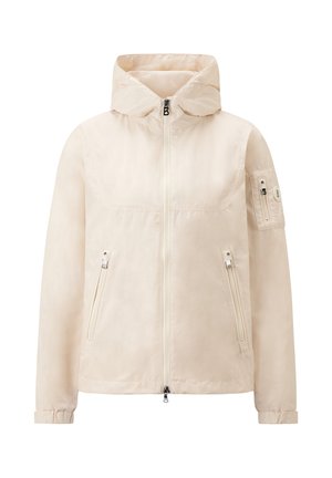 Lightweight cream jacket with a zip front, adjustable hood, two zippered pockets, and a subtle sheen. Features a logo patch on the sleeve.