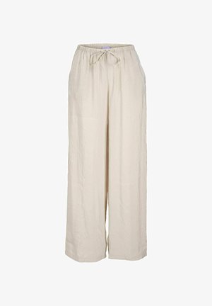 Laiad, heledad beezid püksid elastse vöökoha ja nööriga. Valmistatud pehmest kangast, millel on sile tekstuur ja ei ole nähtavaid mustreid.