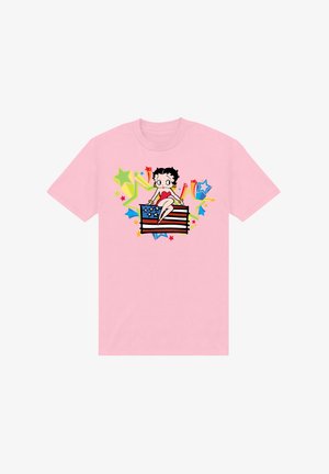 Lyserød bomulds-T-shirt med en tegneseriefigur, der sidder på et amerikansk flag, omgivet af farverige stjerner og sprøjt. Standard pasform.