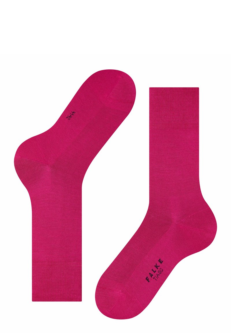 Calzini alla caviglia FALKE di un vivace colore rosa, realizzati in un materiale liscio e elasticizzato; bordo a coste nella parte superiore, con punta senza cuciture per un maggiore comfort.