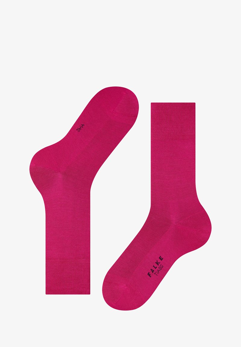 Calzini alla caviglia FALKE di un vivace colore rosa, realizzati in un materiale liscio e elasticizzato; bordo a coste nella parte superiore, con punta senza cuciture per un maggiore comfort.