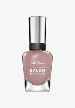 Sally Hansen naglack i en mjuk rosa nyans, glasflaska med silverlock och svart bas, har vit text som märker produkten.