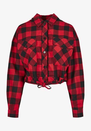 Raudona ir juoda langeliais trumpa striukė su mygtukų uždarymu, dviem krūtinės kišenėmis ir reguliuojamu raišteliu apatėje. Ilgos rankovės.