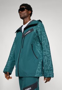 Adidas Terrex Snowboardjakke - aurora ivy/preloved teal