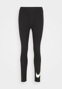 Svarta leggings i stretchtyg, med hög midja och en vit logotypaccents på den nedre vänstra benet. Slät textur och kroppsnära design.