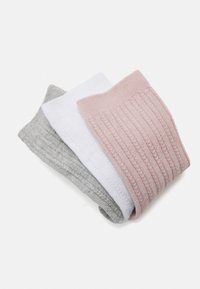 Three pairs of knit socks in gray, white, and light pink. The gray and white socks feature a smooth texture, while the pink has a ribbed design.