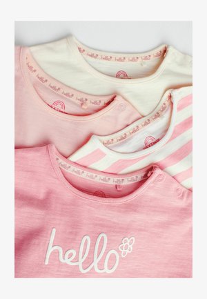 Three baby tops in soft cotton: one solid pink, one light pink with white stripes, and one cream with a pink collar, featuring "hello" design.