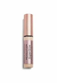Revolution SuperSize Conceal & Define i et cylindrisk rør i rosaguld med et klart vindue, der viser det cremede beige produkt indeni.