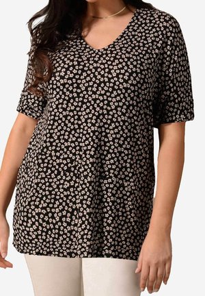 Musta lyhythihainen paita, jossa on V-pääntie ja pieni valkoinen kukkakuosi. Iloinen malli, jossa on sileä pinta ja suora helma.