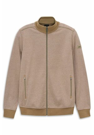 Beige Reißverschlussjacke aus strukturiertem Mesh-Gewebe, mit kontrastierendem Kragen und Bündchen, zwei Seitentaschen und einem dezenten Logo-Patch am Ärmel.