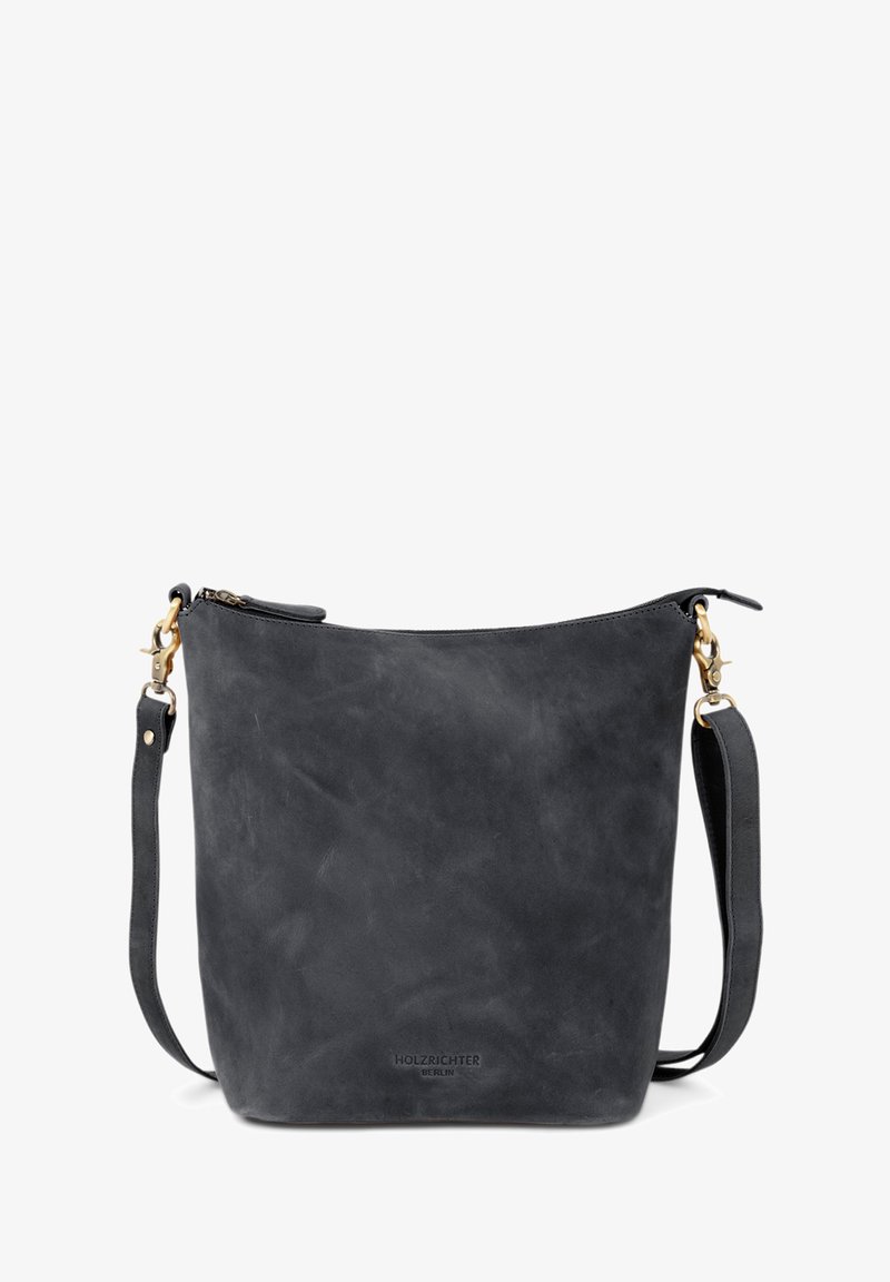 Black leather crossbody bag with a smooth, matte texture, featuring a top zipper, adjustable strap, and gold-tone hardware accents.