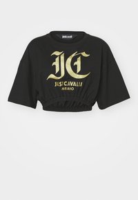 Mustan lyhyen hihaisen t-paidan, jossa on pyöreä pääntie ja kultaglitterinen logo, jossa lukee "Just Cavalli Milano". Elastinen helma.
