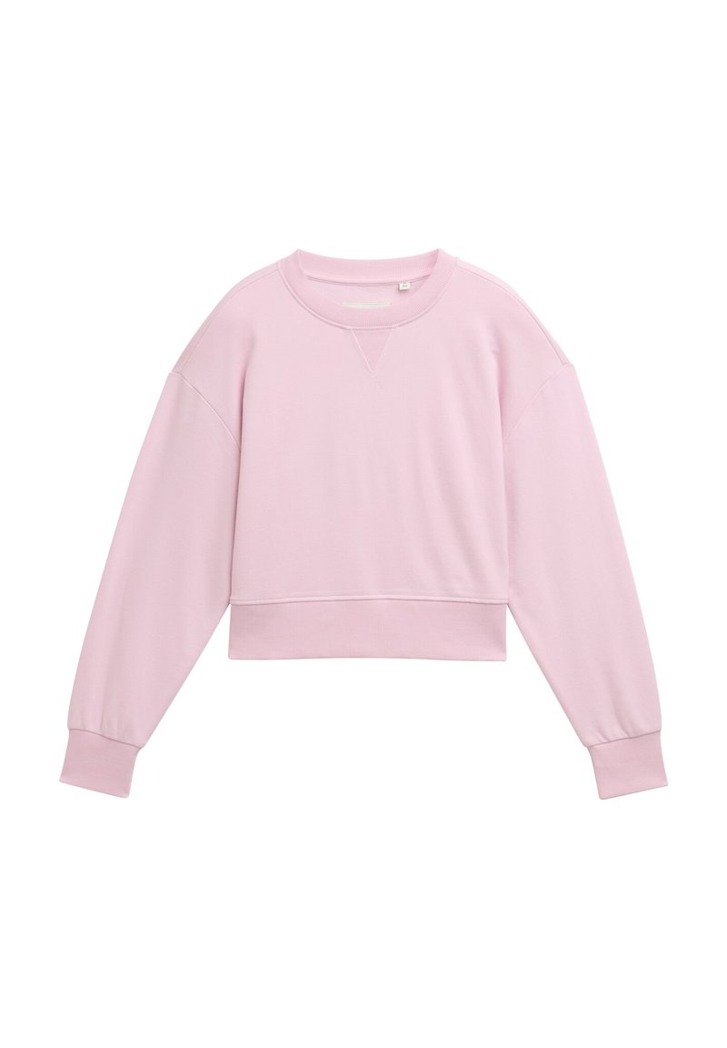 Jasnoróżowy, krótki sweter z długimi rękawami, ściągaczami oraz okrągłym dekoltem. Wykonany z miękkiego materiału o gładkiej fakturze.