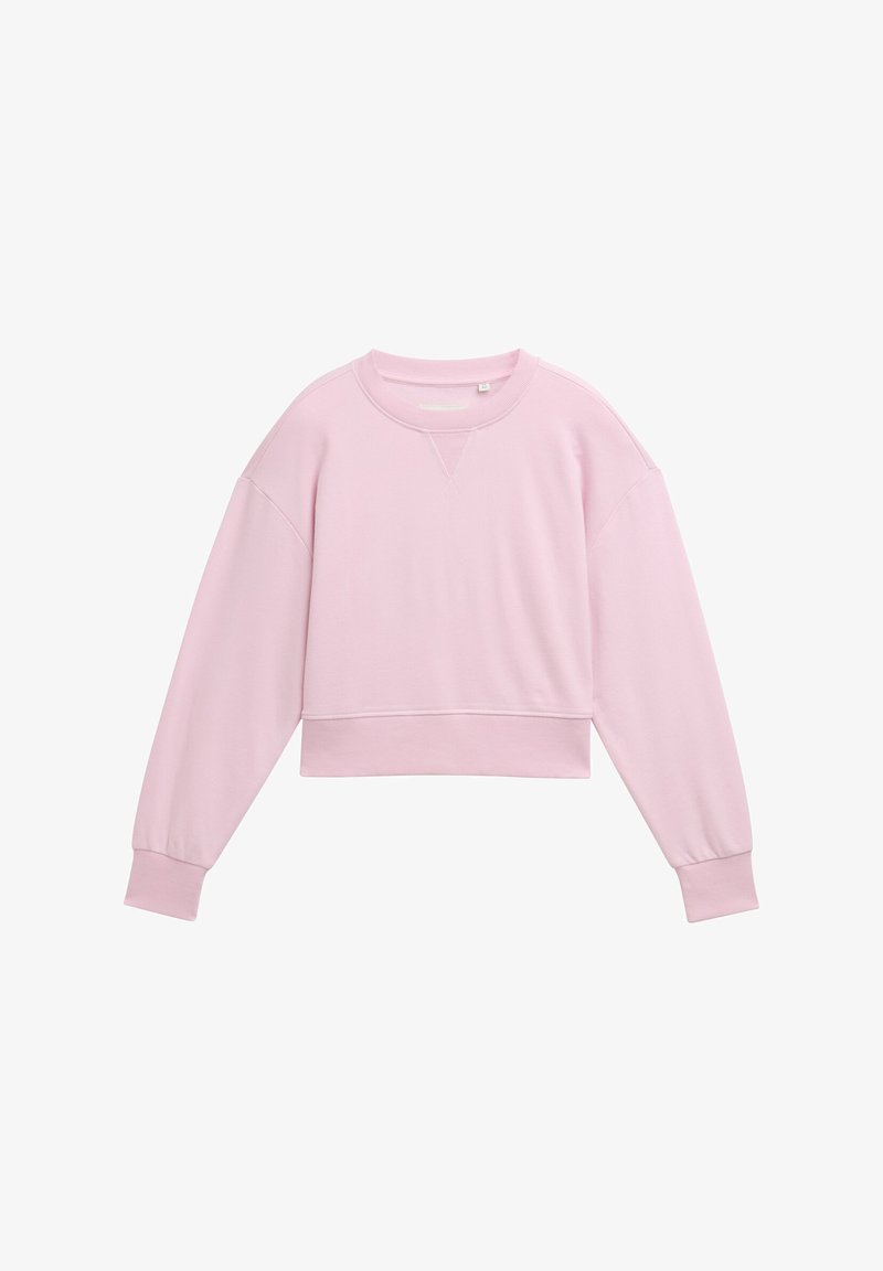 Jasnoróżowy, krótki sweter z długimi rękawami, ściągaczami oraz okrągłym dekoltem. Wykonany z miękkiego materiału o gładkiej fakturze.