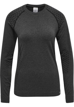 Svart långärmad sweatshirt med texturerade detaljer på axlarna, rund crew neck och ribbad fåll. Tillverkad av lätt och andningsbart material.