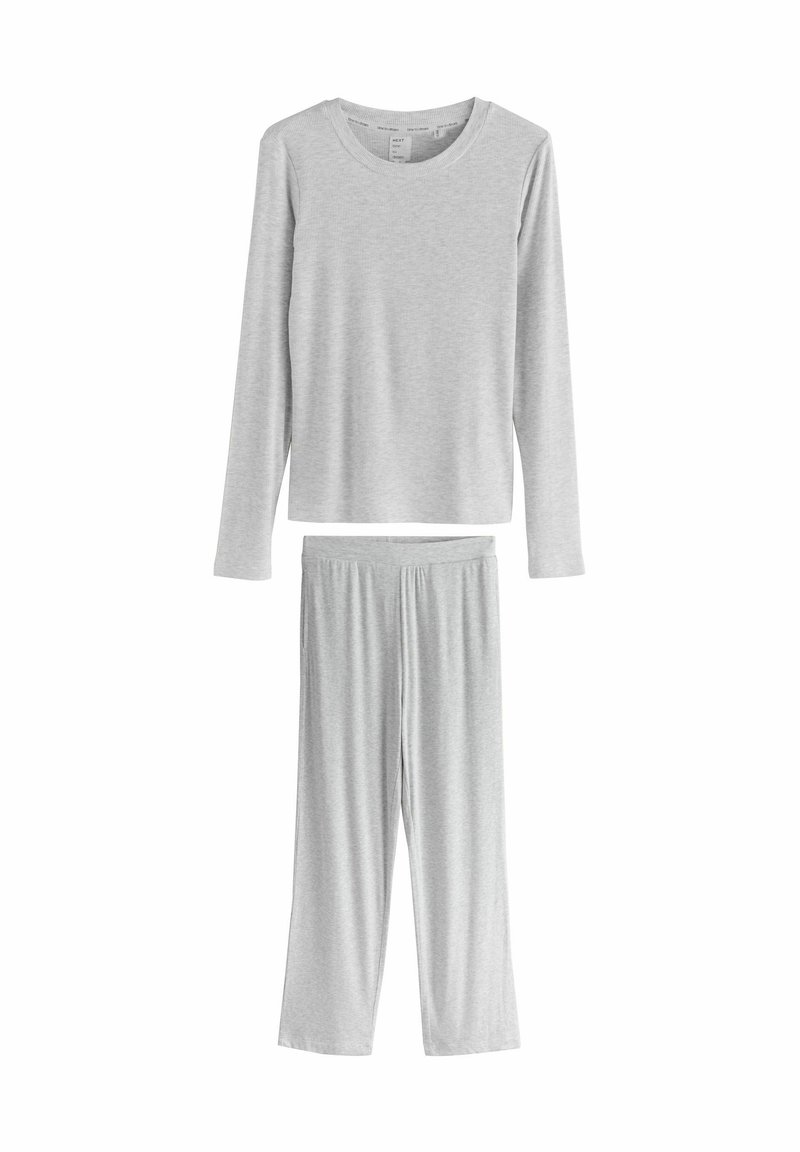 Heledad hall-särg ja sobivad lahtised püksid pidžaamasegment, mis on valmistatud pehmest ja kergest kangast.