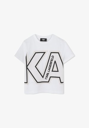 Witte katoenen cropped t-shirt met een groot zwart en gouden "KA" logo met diagonale lijnen, korte mouwen en een ronde halslijn.