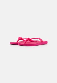 Havaianas TOP UNISEX - T veida siksniņu sandales - pink electric