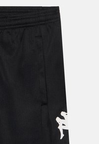 Kappa LORENTE UNISEX - Donji dijelovi trenirke - black