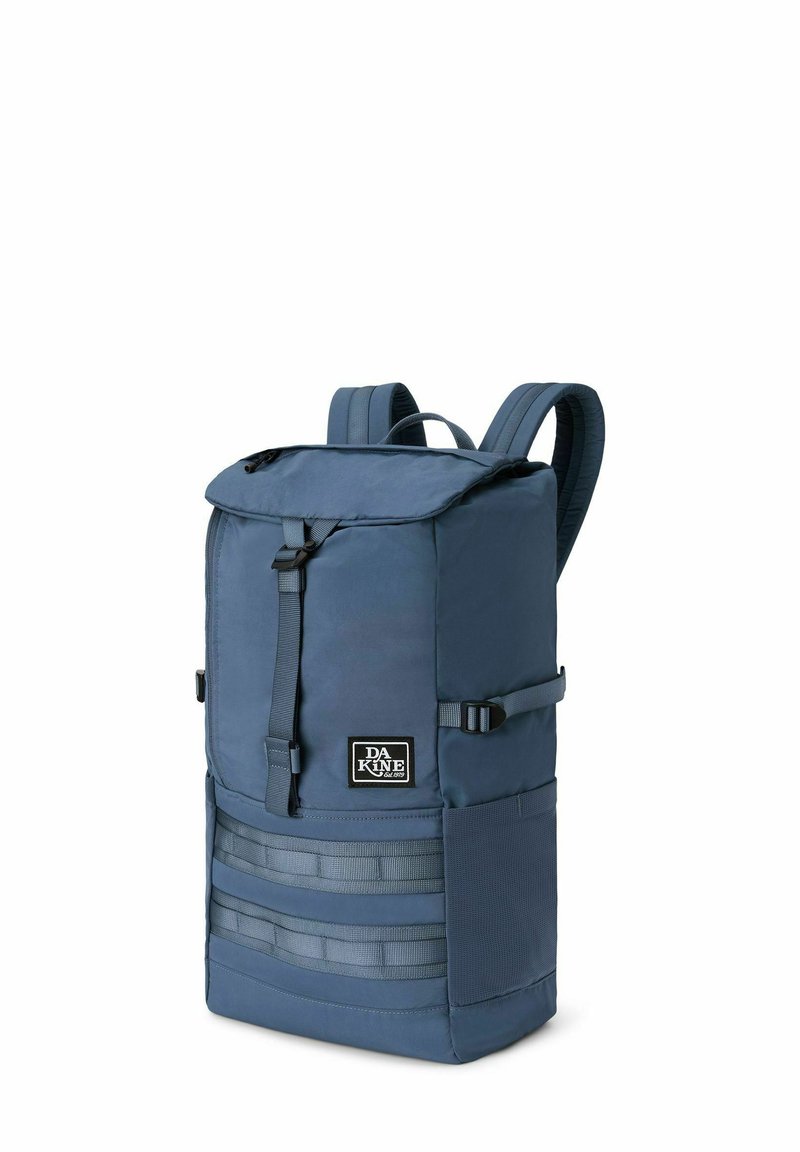 Dark blue backpack with a robust fabric, a flap closure, adjustable straps, and webbing accents on the front for extra storage.