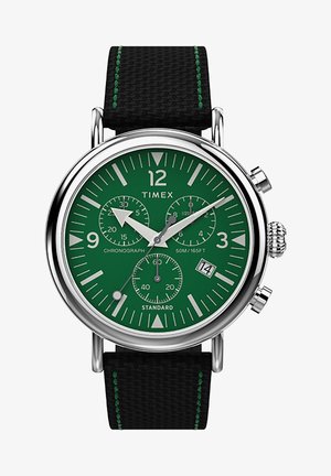 Reloj cronógrafo Timex con esfera verde, bisel plateado, correa texturizada negra y costuras verdes contrastantes; incluye pantalla de fecha.
