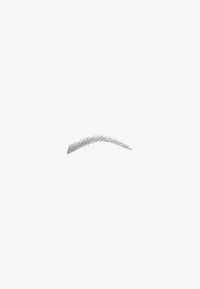 Sourcil noir avec des traits de cheveux fins et texturés sur un fond uni gris clair.