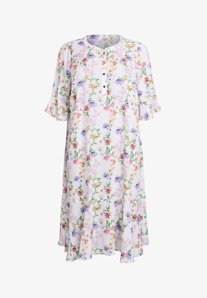 Valge põlveni ulatuv kleit mitmevärvilise lillemustriga, ümmarguse kaelusega, lühikeste volangiliste varrukatega ja esipoolse nööpimisega.