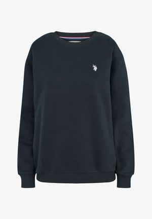 Tumedat sinise värvi pusake, millel on pikad varrukad, ümmargune kaelus ja soonitud mansetid. Rinnas on väike valge logo. Materjal paistab olema pehme.
