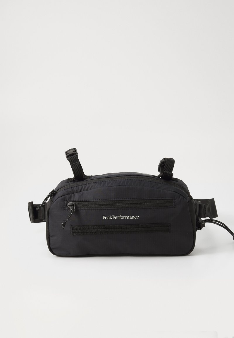 Black waist bag with multiple zippers, adjustable straps, and a smooth texture. Features a logo and practical design for easy carry.