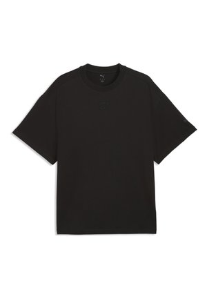 Ensfarvet sort t-shirt med korte ærmer, et lille Puma-logo og subtil tekstureret design på brystet, vist mod en hvid baggrund.