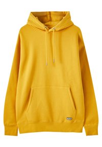 Sweat à capuche jaune avec poche avant et cordons, manches longues, et une petite étiquette de marque rectangulaire près de la poche.