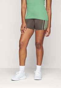 adidas Performance HYPERGLAM - Tajice - shadow olive/green spark