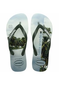 Ciabatte verdi con cinturini neri testurizzati, raffiguranti una grafica di palma su un sottopiede azzurro chiaro. Marchio Havaianas ben visibile.