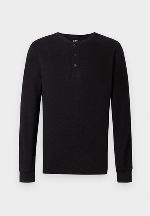 Black long-sleeve henley shirt with a three-button placket at the neck, soft texture, and ribbed cuffs, featuring a classic fit and minimal design.