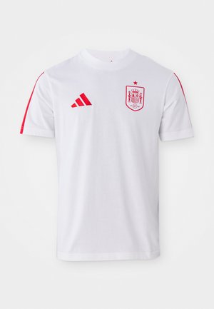 Camiseta de fútbol blanca de Adidas con acentos rojos, presenta un cuello redondo, mangas cortas y el logo de la selección nacional de España en el pecho.